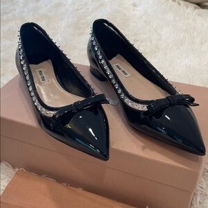 Miu Miu black patent flats. Pointed toes with clear trim with crystals. NWT!